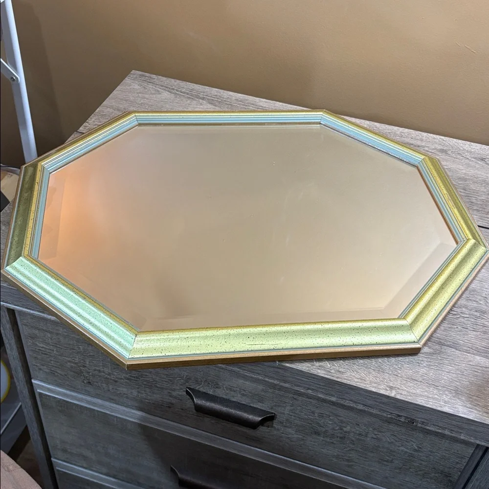 A mid century modern style octagonal mirror vertical or horizontal orientation